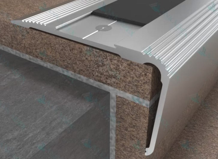 A view of the stainless steel countertop with an aluminium stair nosing.