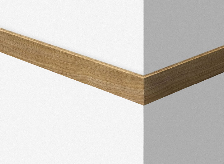 A corner of a white wall with a wooden trim, featuring Wood Corner Guards.