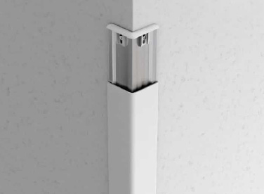 A white wall corner with a metal bracket.
