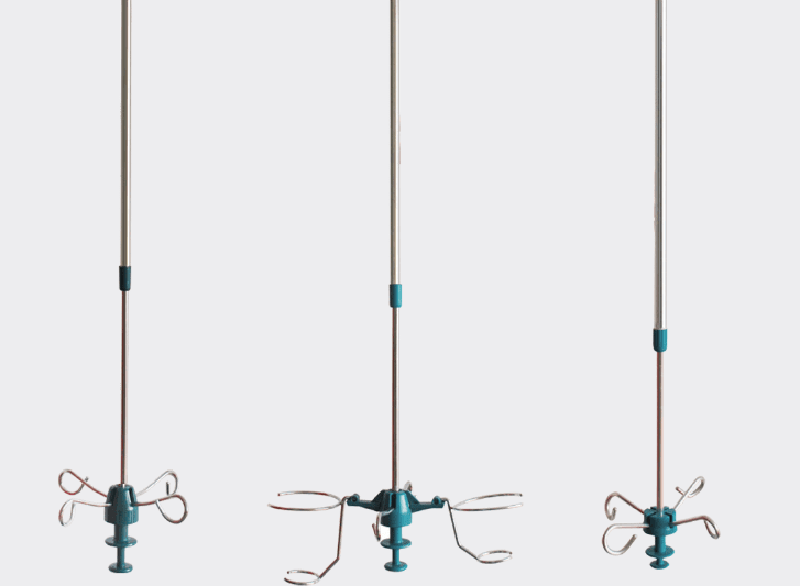A group of blue and white hanging lights on curtain rails.
