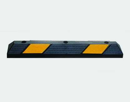 A black and yellow car bumper with yellow stripes and rubber wall guard.