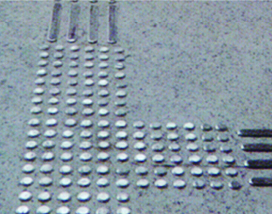 A picture of a metal plate with screws on it showcasing Warrior WPS' PVC Corner & Wall Guard Protection Solutions.