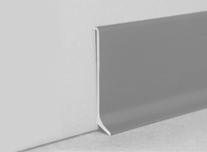 An image of a grey corner of a wall with aluminium skirting.