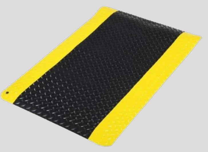 A yellow and black mat with a diamond pattern, perfect for those seeking to buy anti fatigue mats or hollow mats.