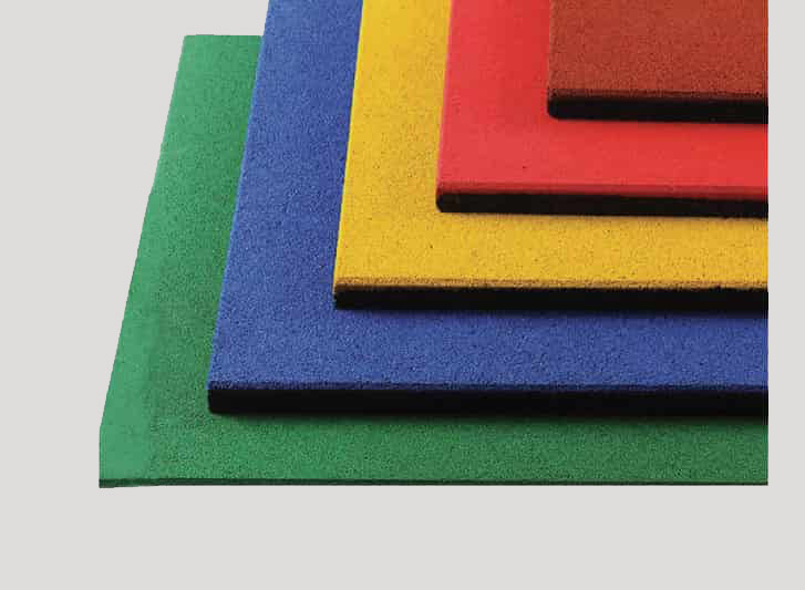 A stack of colorful foam anti fatigue mats on a white background.