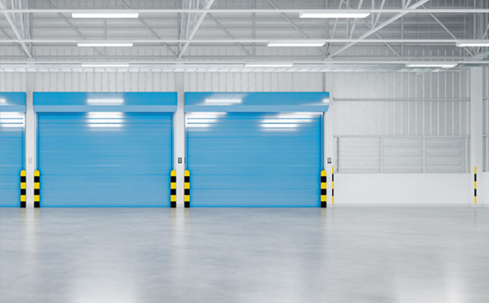 Blue roller doors in a warehouse.
