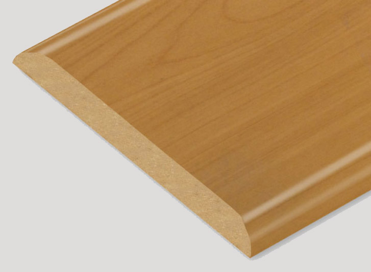 A close up image of a wooden floor trim and Wood Corner Guards.