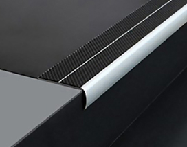 Warrior WPS offers PVC corner and wall guard protection solutions, including a close-up of a black and white surface.