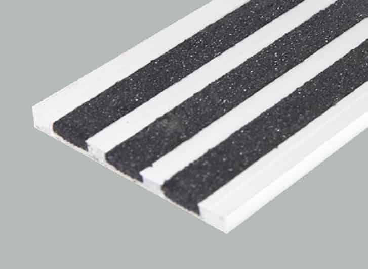 A gray surface with a white and black stripe.
