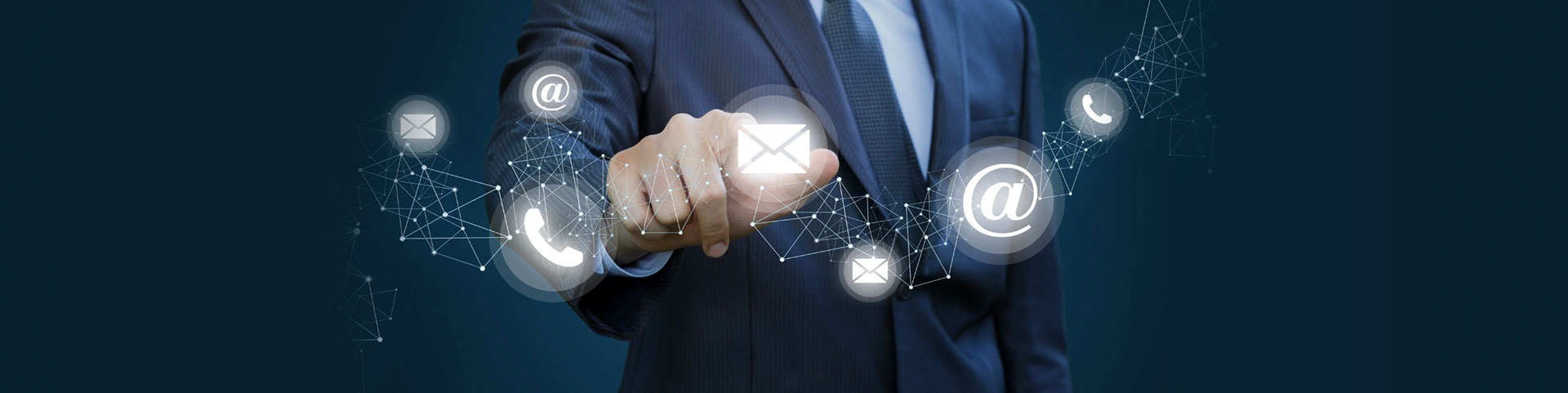 A man in a suit is holding a hand with contact icons on it.
