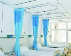 A room with several beds featuring PVC Corner & Wall Guard Protection Solutions from Warrior WPS.