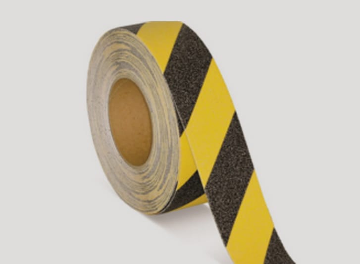 A roll of yellow and black striped antislip tape.