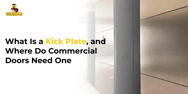Stainless steel kick plate fitted along the bottom of a commercial swing door in a busy warehouse corridor